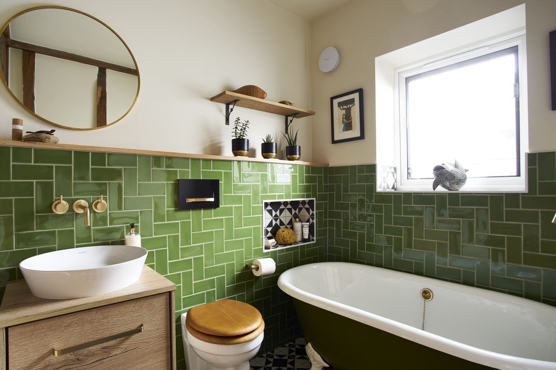 green chevron tiles in bathroom