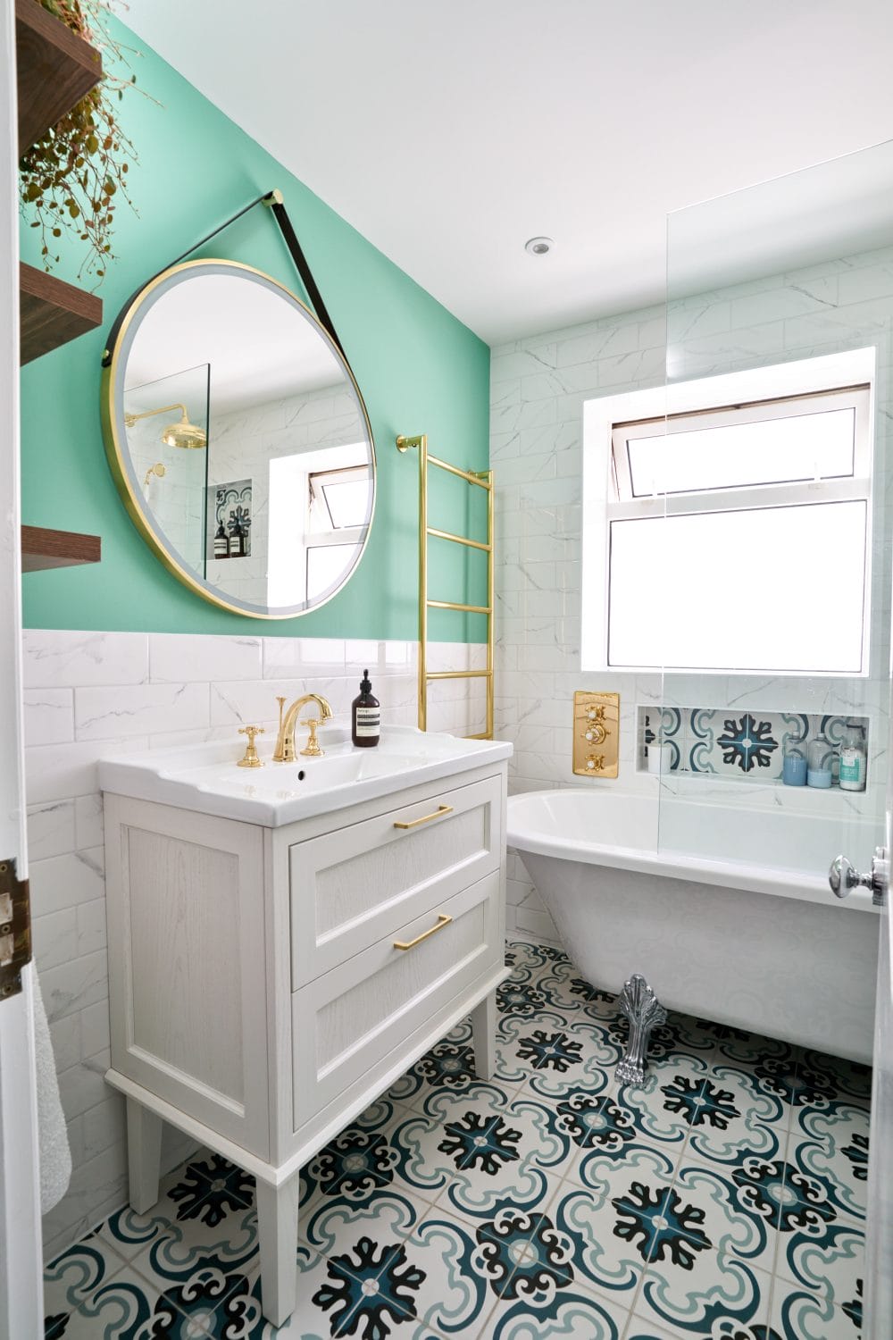 White Bathroom Vanity with Gold Handles and Taps