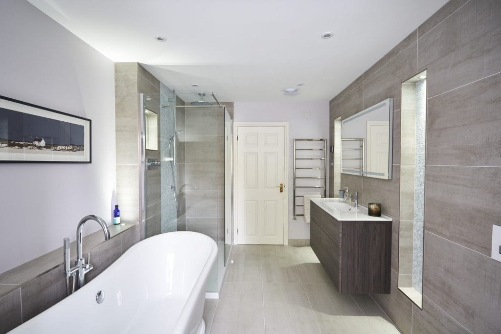 Contemporary Bathroom Design with Freestanding Boat Bath and Timber Vanity