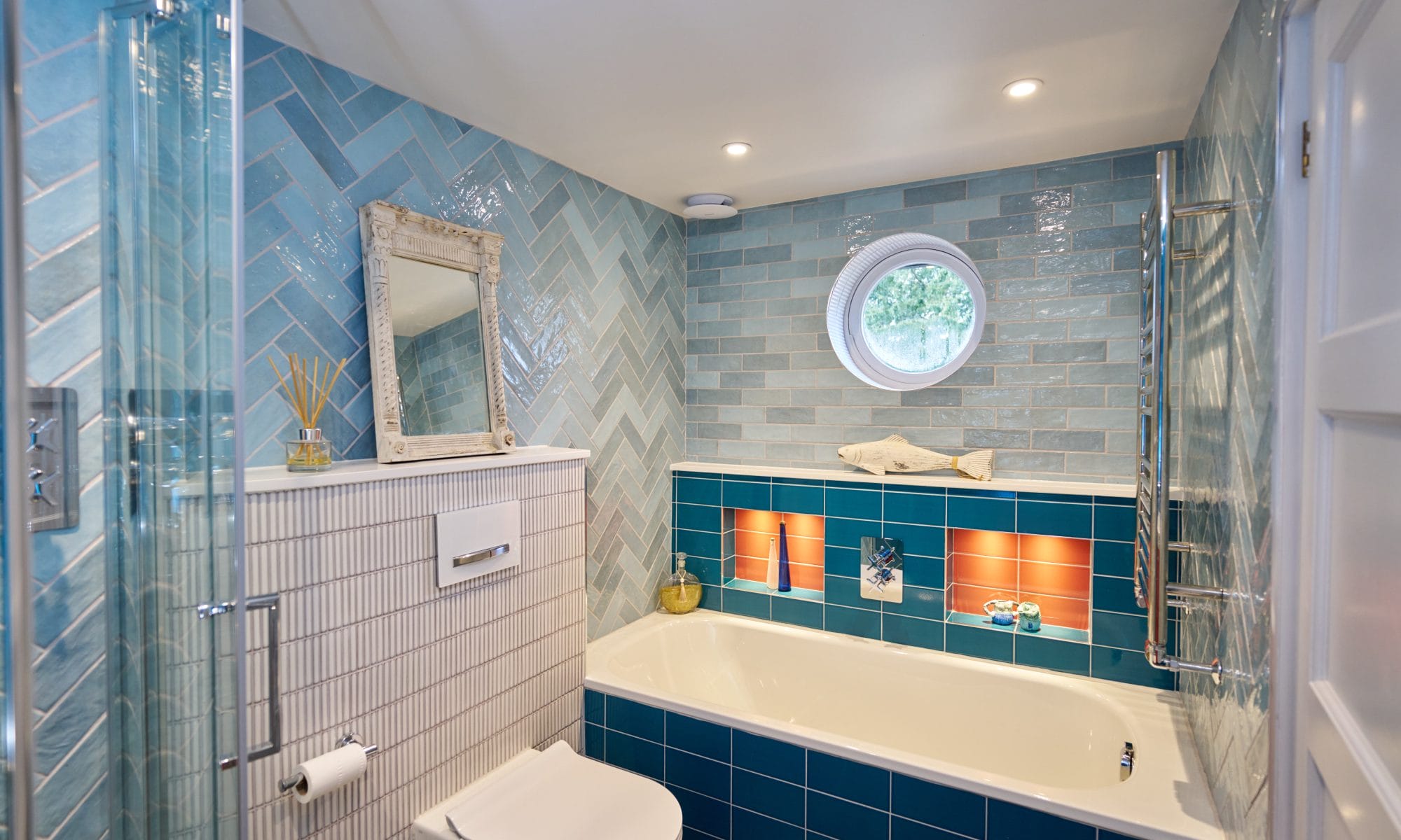 Bathroom Design in Handcross with Blue and Red Tiles